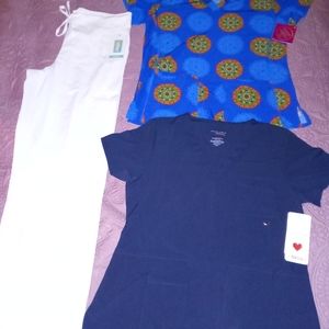 2 brand new scrub tops and scrub pant still has tags on tops and pants